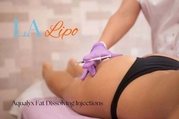 Woman having fat dissolving injections Rugby on thighs