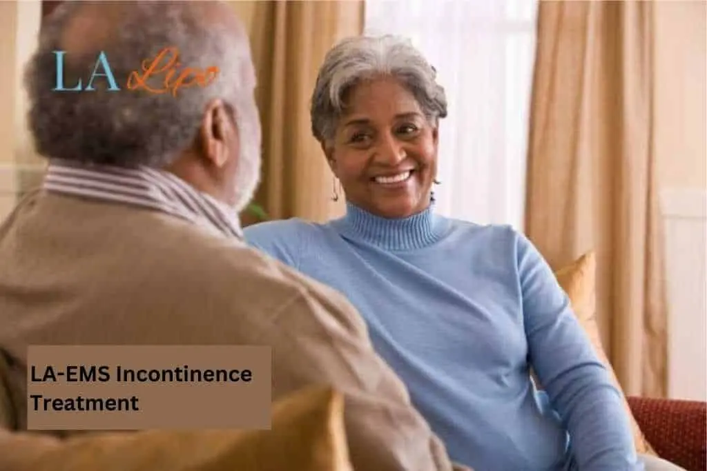 Couple sat smiling at each other - LA-EMS treatment Rugby
