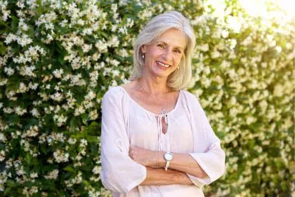 Older woman happy with urinary incontinence treatment Rugby